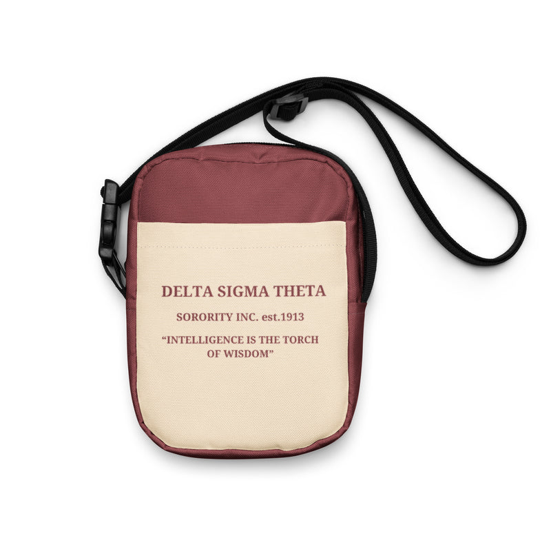 Delta Crest Crossbody Bag